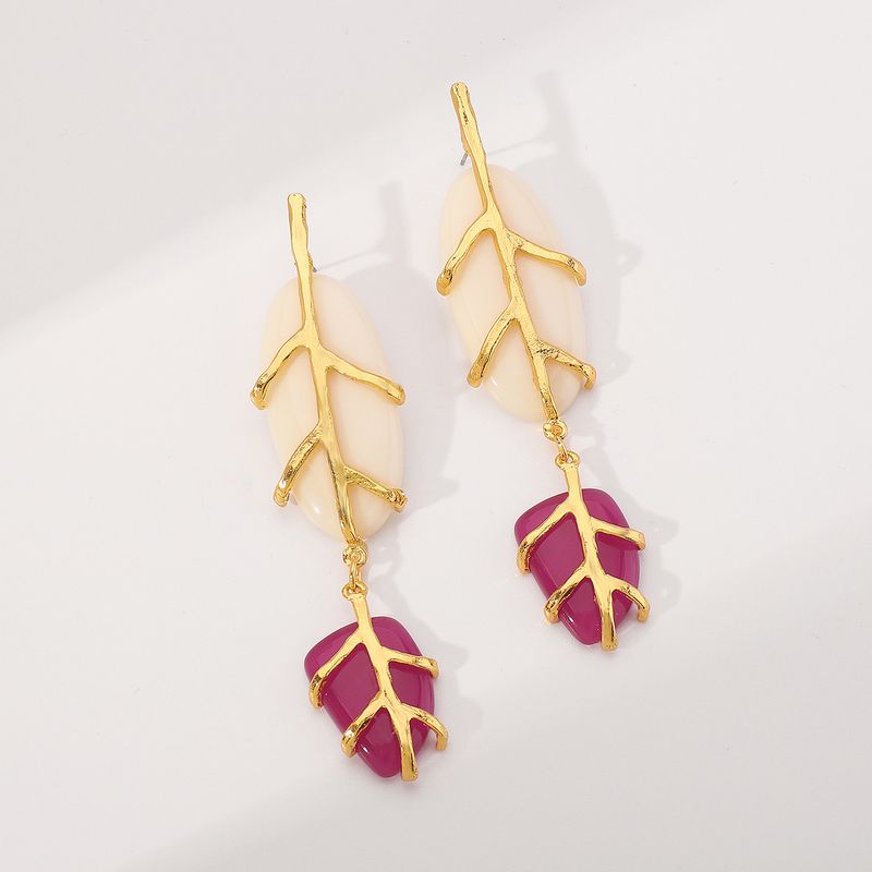 E12675ZA Azonos stílusú fülbevalók Divatos levélmintás gyanta temperamentumos sokoldalú női fülbevalók_voghion.com