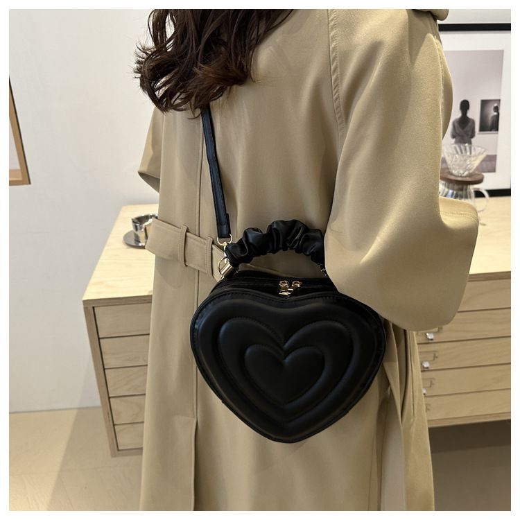 Indentatura semplice a forma di cuore carina tinta unita femminile cuore shopping moda plissettata borsa a tracolla_voghion.com