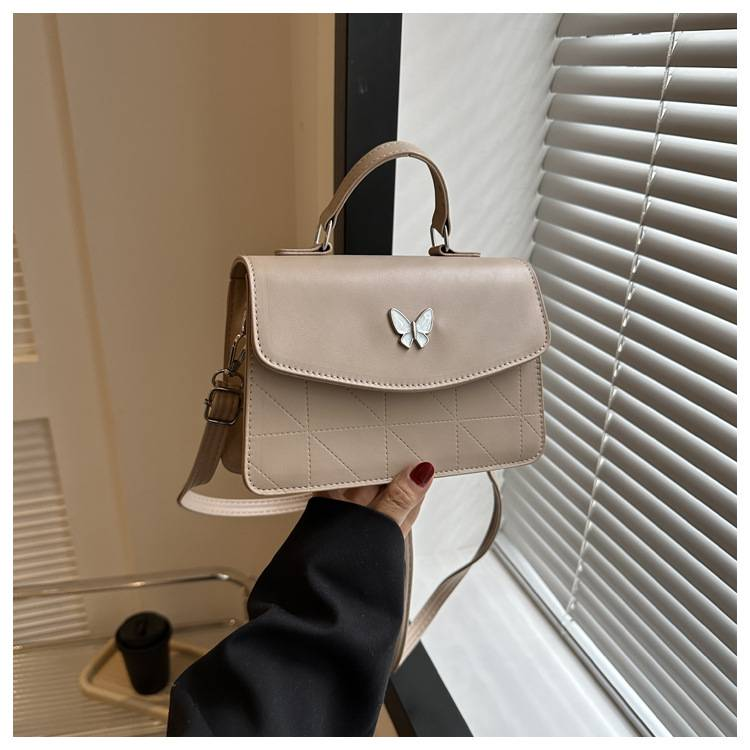 Fransk lyxig handväska i mild stil Butterfly Dekorativ liten väska Dam 2024 Sommar Ny västerländsk stil Crossbody-väska med en axel_voghion.com