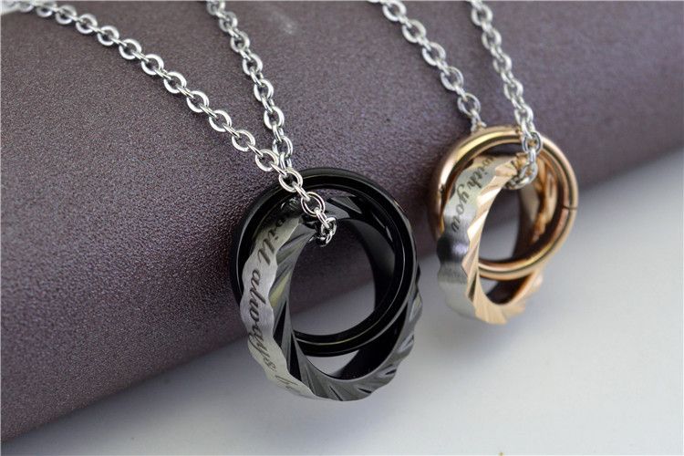Collana di coppia in titanio con ciondolo in acciaio inossidabile, anello ondulato a doppio cerchio, design di nicchia per gioielli da uomo_voghion.com
