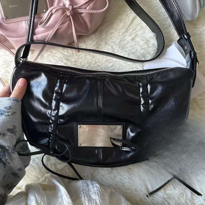 2025 Korean Niche Metal Tag Bow Drawstring Bag Handbag_voghion.com