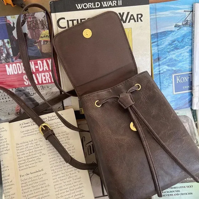 Mochila pequeña con solapa y cordón para mujer, de piel sintética con textura, para la escuela, de viaje, 250514l_voghion.com