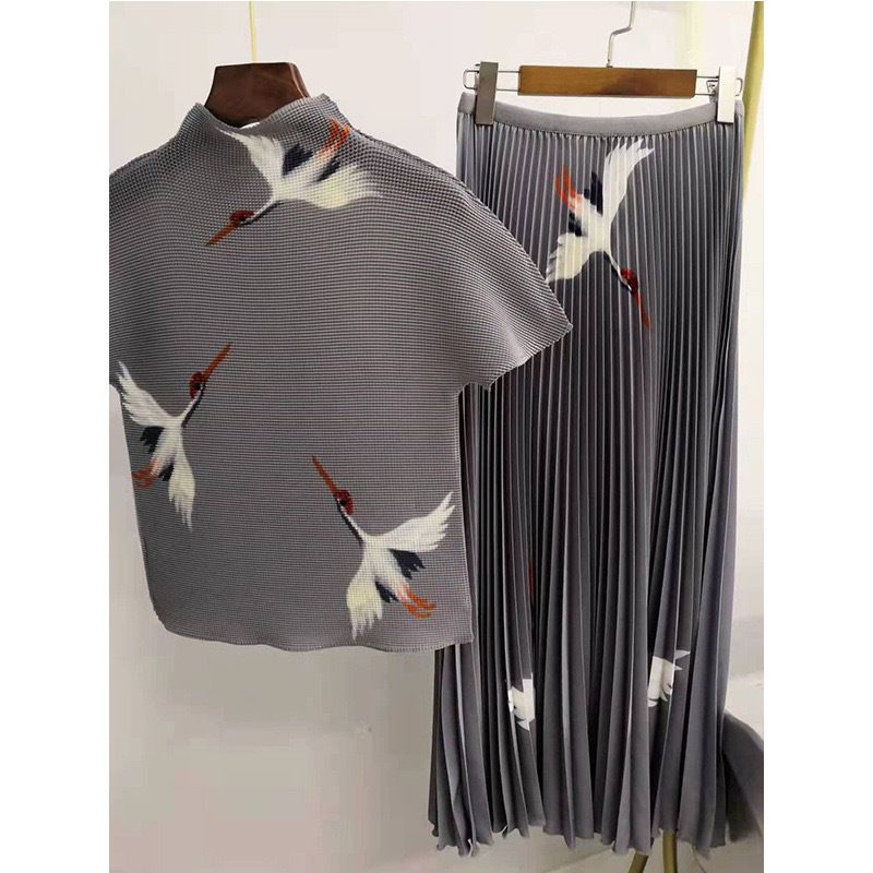 Vêtements pour femmes été nouveau style rajeunissant haut plissé extensible jupe imprimée costume de mode deux pièces_voghion.com