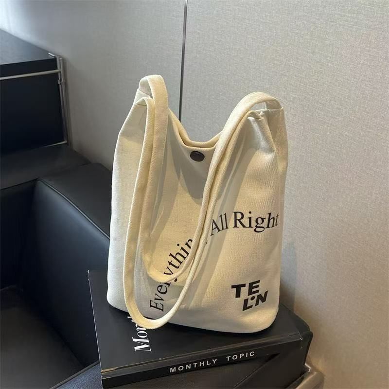 Canvas Shoulder For Women 2025 Spring Summer New Commuter Underarm Bucket Large Capacity Tote Bag_voghion.com
