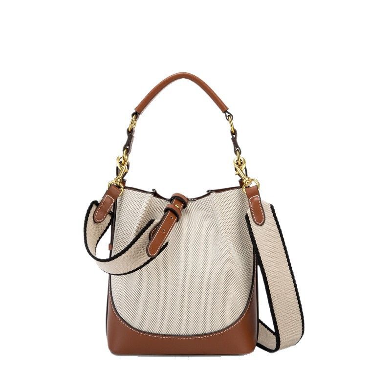 Spain 2025 New Women's Brown Pleated Drawstring Versatile Handbag Bucket Wide Shoulder Strap Crossbody Bag_voghion.com