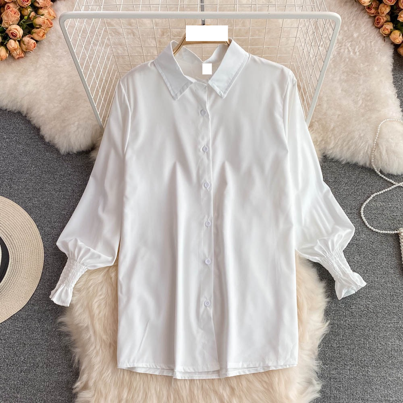 Il maglione con gilet diviso in carne da donna con copertura ampia e piega indossa due set_voghion.com