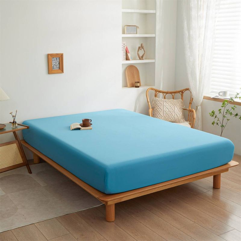 Drap-housse uni – Protège-matelas extensible et antidérapant (blanc, rose, bleu ciel et plus) – Couvre-lit minimaliste moderne_voghion.com