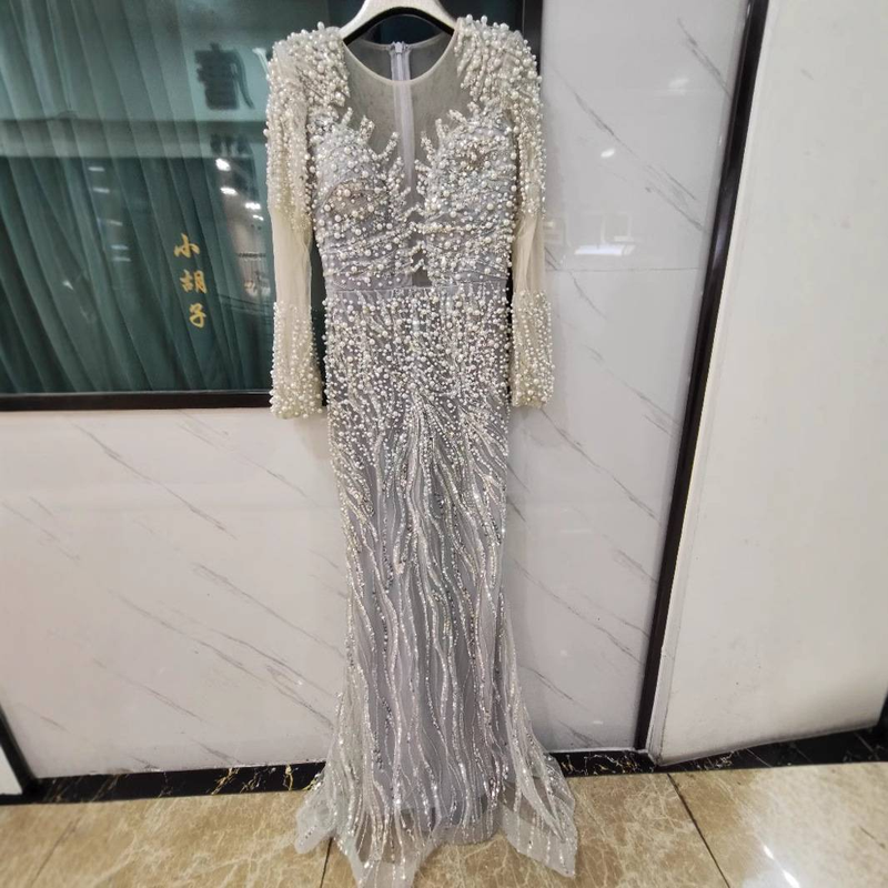 Elegantes bodenlanges Abendkleid mit tiefem V-Ausschnitt und funkelnden Pailletten – Perfekt für Galas, Hochzeiten und besondere Anlässe_voghion.com