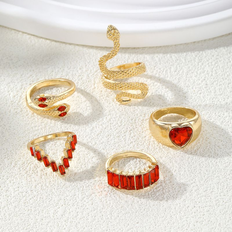 Set di anelli con gemme intarsiate geometriche retrò New Tide Individuality 2024, set di anelli in metallo liquido a quattro pezzi, Paty Jewelry_voghion.com