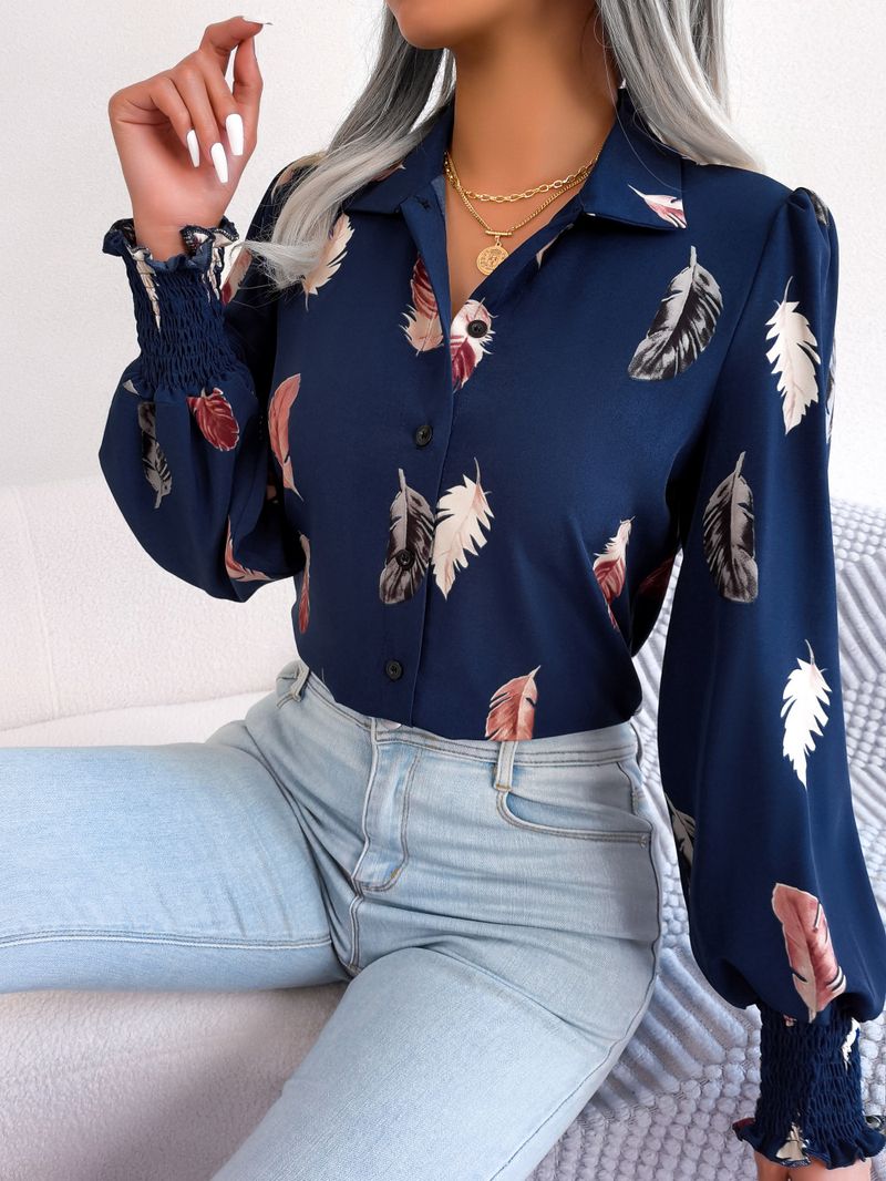 Abito da donna con camicia con risvolto e maniche a lanterna in piume di temperamento_voghion.com