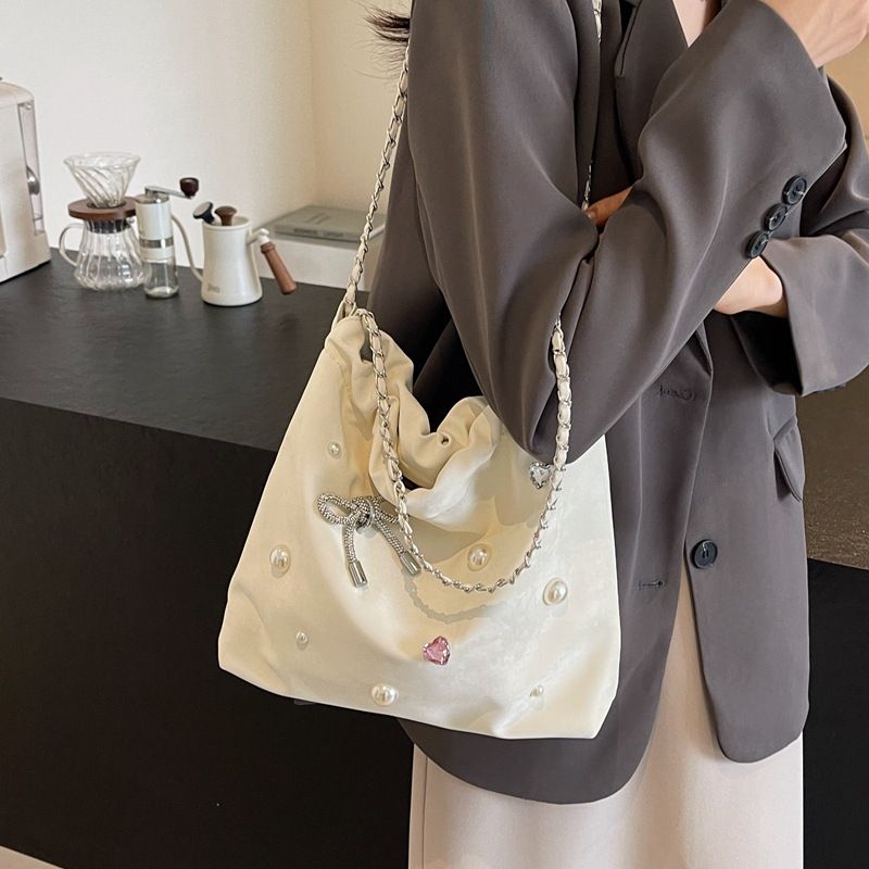 Borsa a secchiello semplice e casual nuova primavera ed estate 2024 della moda coreana da donna_voghion.com