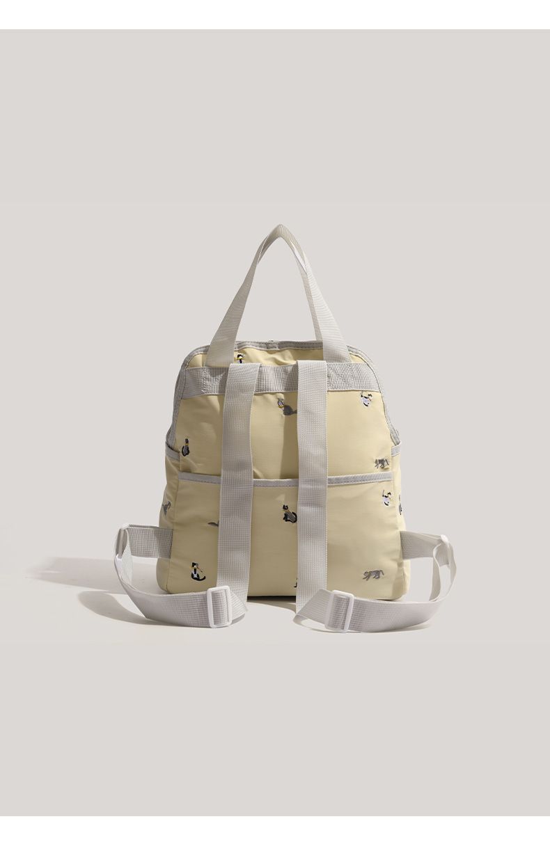 Apricot Embroidery Cat Multifunctional Handbag 2025 New Multifunctional Lightweight Ladies Travel Mommy Bag_voghion.com