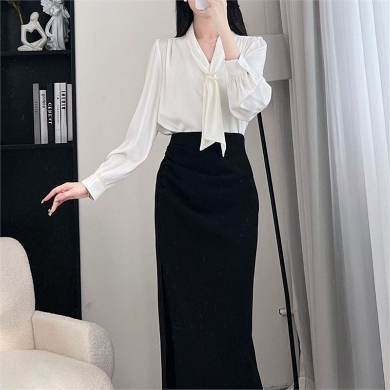 Novità primavera 2025, elegante completo da due pezzi con gonna e camicia a maniche lunghe con fiocco_voghion.com
