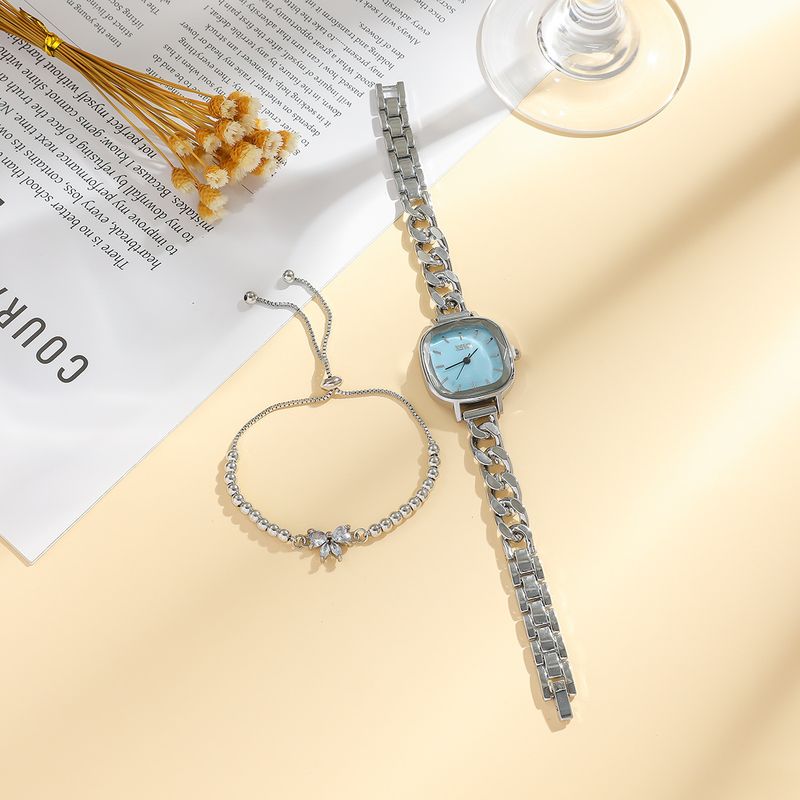 Dameur og smykkesæt med lilla Aurora-urskive og firkantet armbåndsur + armbåndssæt med sommerfuglesten til studerende_voghion.com