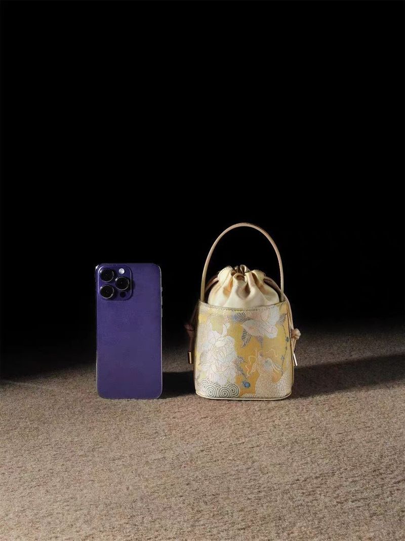 Borsa a secchiello portatile da donna in stile nazionale cinese Kirin Peony, mini 2025_voghion.com