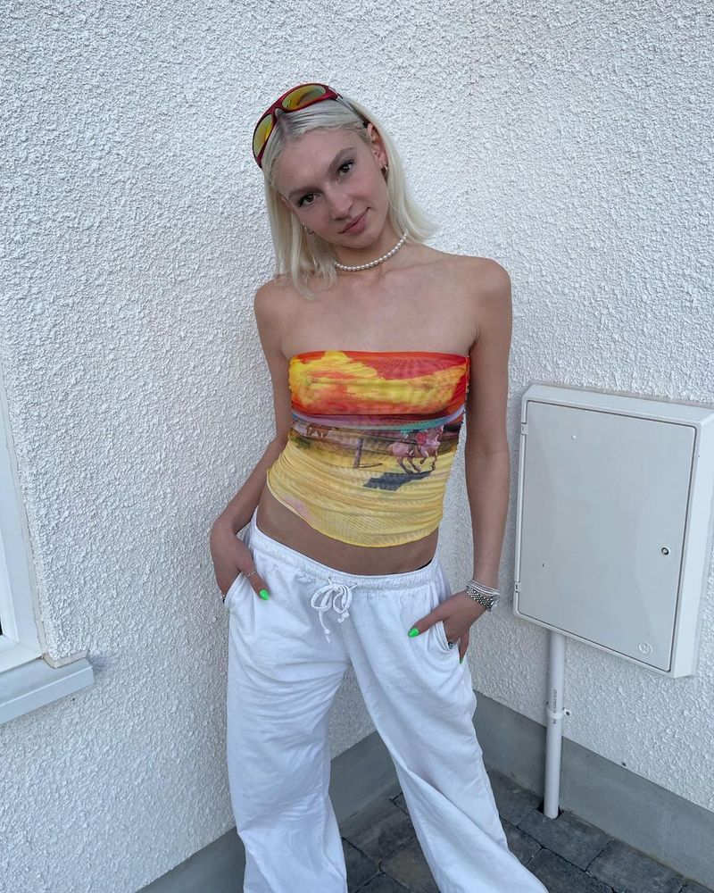 Qi Duo 2022 Nuova ragazza sexy e calda irregolare senza spalline estiva che indossa un gilet in maglia_voghion.com