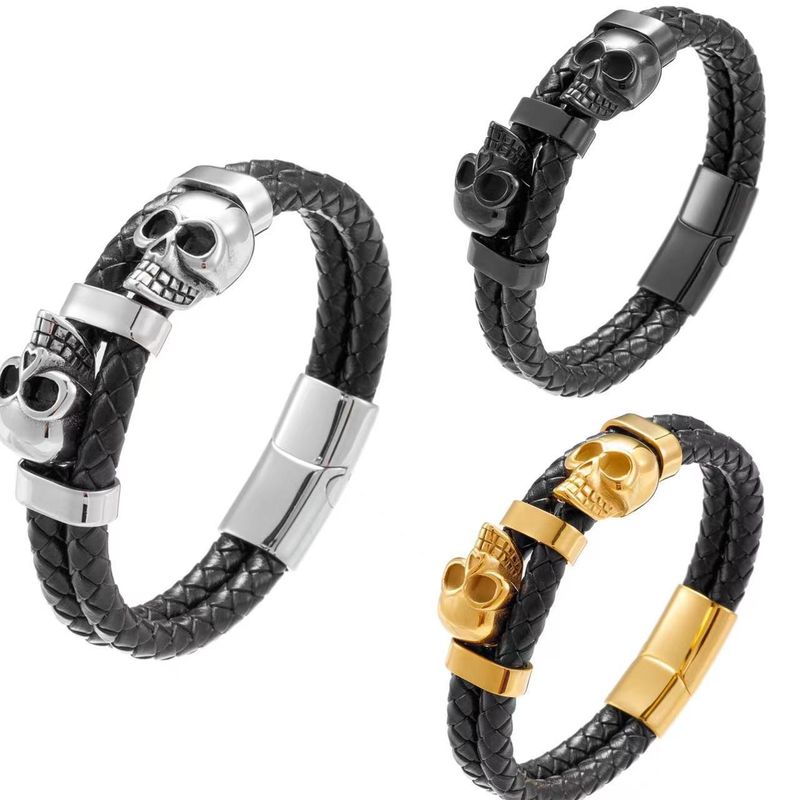 Bracciale da uomo in pelle intrecciata, stile punk scuro, fatto a mano, con teschio_voghion.com