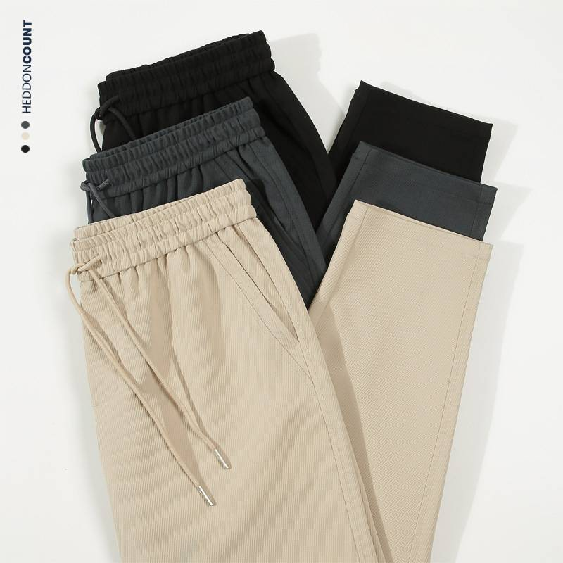 Vīriešu apģērbs Dengjue vīriešu plānas tvīla ikdienas bikses, vīriešu 2024. gada vasaras jaunas, pret grumbu drapējuma, taisnas, vienkrāsainas, deviņu punktu bikses vīriešiem_voghion.com