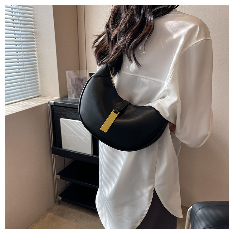 Borsa ascellare dal design di nicchia francese per la nuova borsa a mezzaluna minimalista primavera 2023 da donna Borsa a tracolla questa sensazione_voghion.com