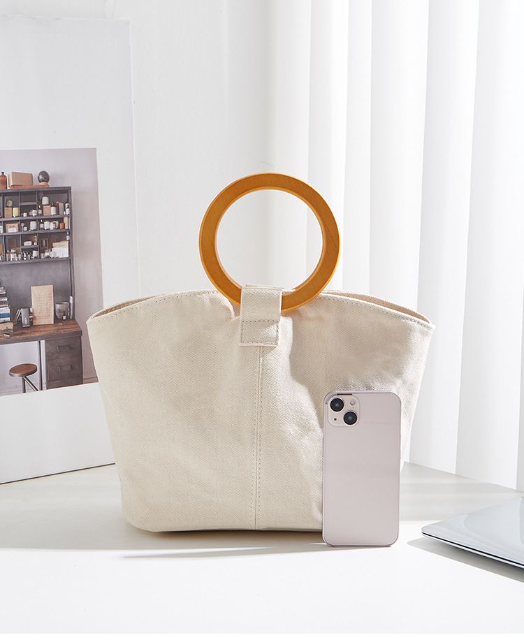 Borsa versatile e di grande capienza in versione coreana, la nuova borsa da donna minimalista in tela di quest'anno, manico in legno_voghion.com