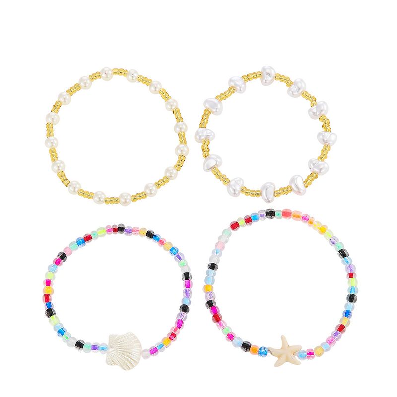 Braccialetti d'oro Bracciale d'oro Set di conchiglie a stella marina bohémien Bracciale di perle colorate da spiaggia estiva_voghion.com