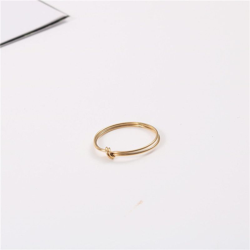 Anello da donna placcato oro 18 carati con nodo, design geometrico minimalista, fascia impilabile, misure 6-8_voghion.com