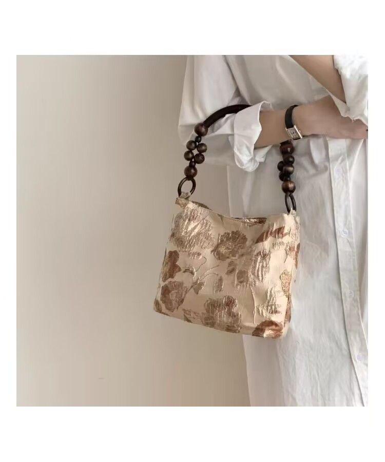 Caramel macchiato low-key jacquard fabric tomssie summer new shoulder and armpit bag_voghion.com