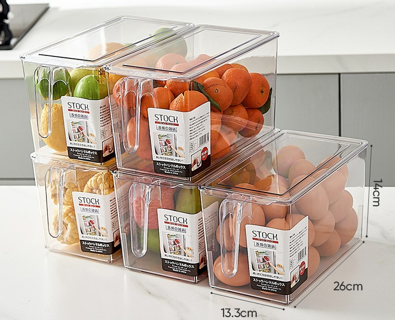 Las verduras y frutas de cocina hechas de material de alta transparencia con asa en la tapa se pueden apilar con una caja de almacenamiento en el refrigerador para mantenerlas frescas._voghion.com