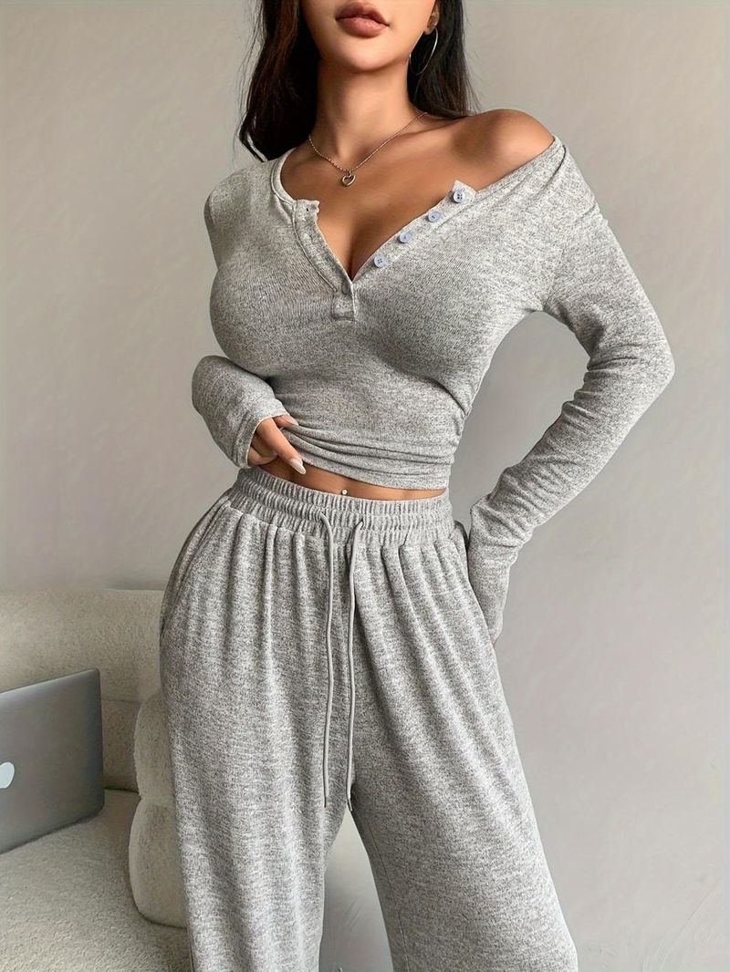 Conjunto de duas peças feminino, blusa slim de cor sólida com botões e calças compridas, novo outono de 2024_voghion.com
