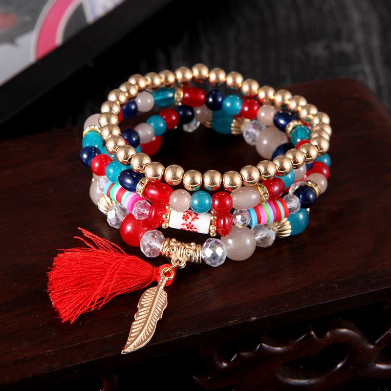 Bracciale con nappe e foglie, set di quattro pezzi con perline multistrato in stile etnico bohémien_voghion.com