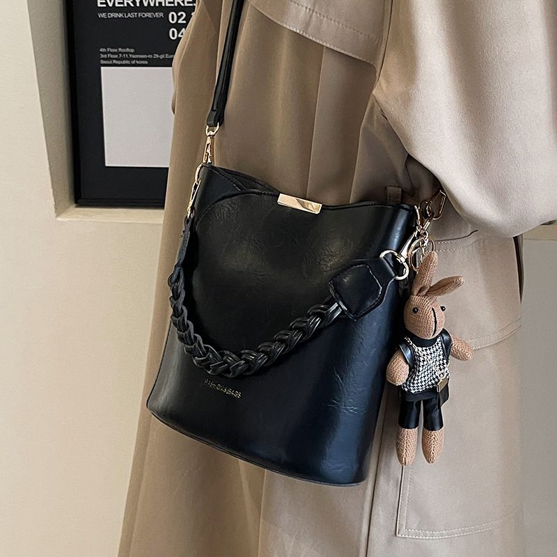 Pequena para mulheres 2025 Nova bolsa transversal versátil de alta qualidade com alça de mão_voghion.com