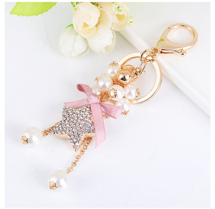 Koreanische Version Exquisite Perlenschleife Anhänger Auto Schlüsselanhänger Mode Kreativer Fünfzackiger Stern Damen Taschenanhänger_voghion.com