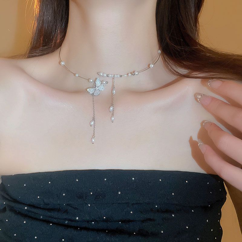Collar de borlas de perlas y mariposa plateada para mujer, nuevo y popular gargantilla de alta gama de 2024_voghion.com