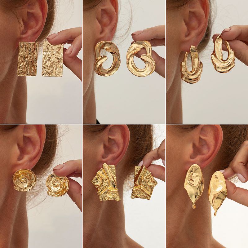 Ins Wind Liquid Metal Lava Folded Female Design Geometric Irregular Hollow Earrings_voghion.com