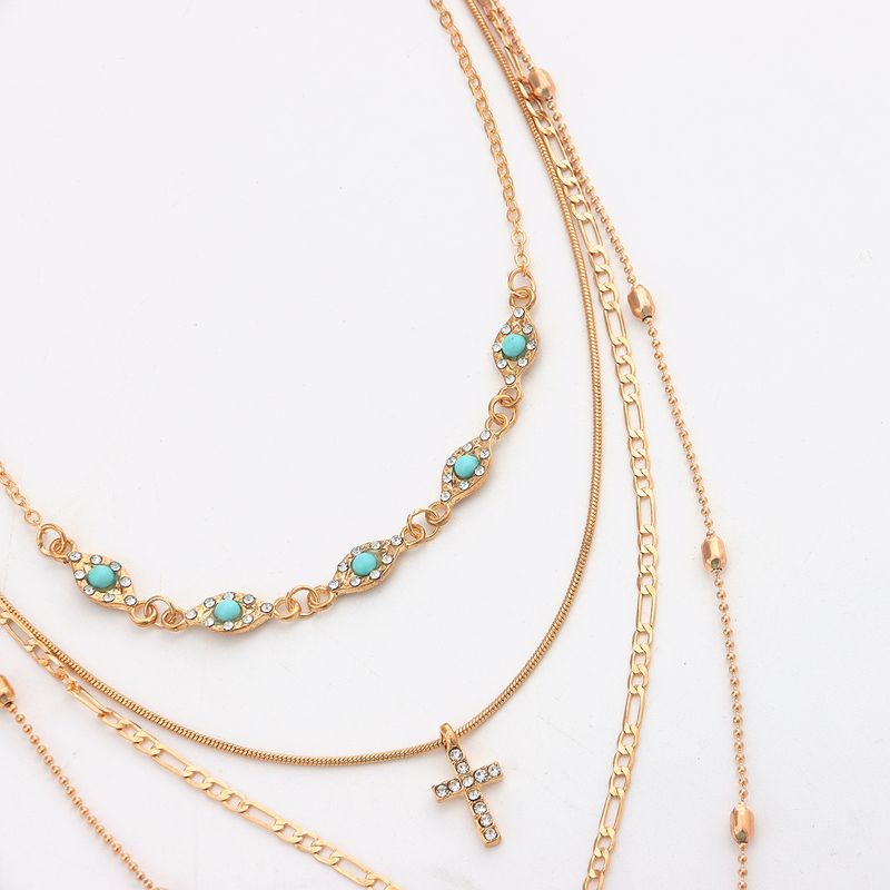 Catena da vita multistrato alla moda con ciondolo a forma di fiore cavo e croce - Design con strass intarsiati per donna, stile INS_voghion.com