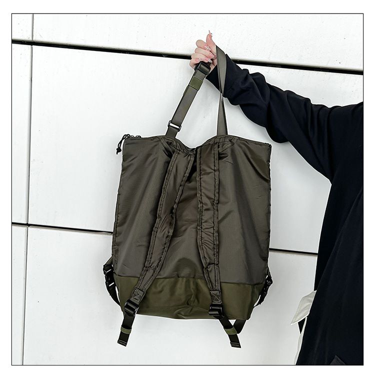 Zaino per uomini e donne Borse da trasporto per pendolari Borsa a spalla singola tinta unita Zaino in nylon antispruzzo di grande capacità Alla moda_voghion.com