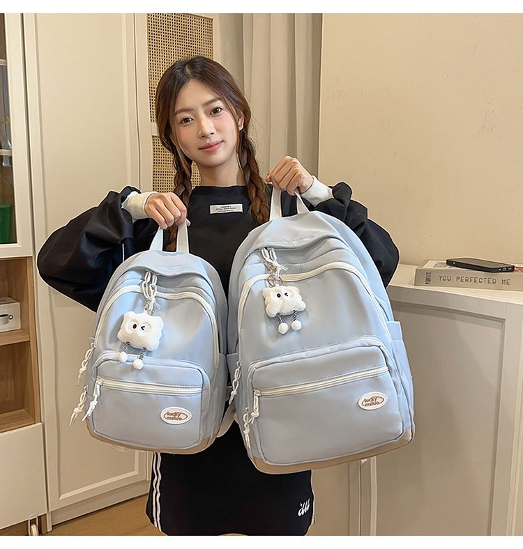 2025 New Trend Simple Solid Color Lightweight Casual Backpack Appearance Middle And High School Students Large Capacity_voghion.com