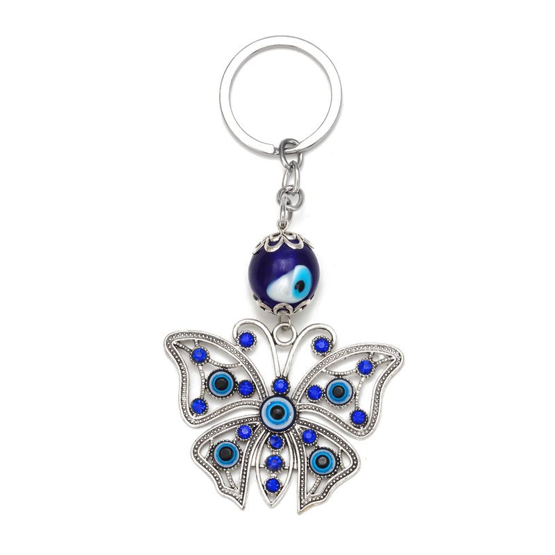 Portachiavi a forma di farfalla in lega con occhio del diavolo, da uomo e da donna, con fibbia per borsa tempestata di diamanti, accessorio da appendere all'auto_voghion.com