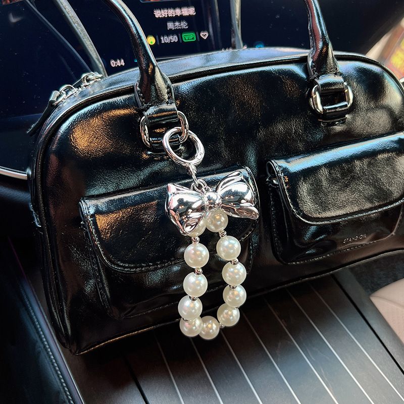 Versione coreana, ciondolo con perline di alta qualità, design di nicchia in oro e argento, papillon, accessori per borse, portachiavi per auto, decorazione_voghion.com