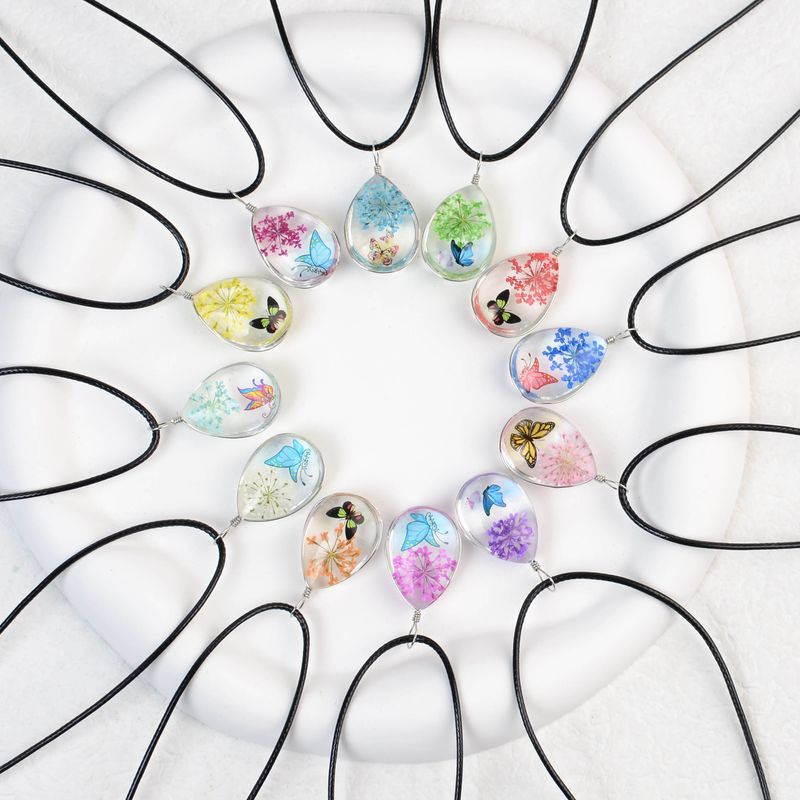 Collana con fiore in pizzo e cielo stellato in stile fresco, goccia d'acqua in vetro, tempo Jingdezhen, vendita calda_voghion.com