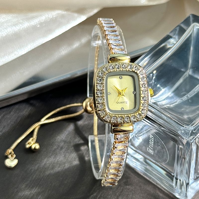 Damenarmbanduhren Zirkon Kleine Zuckerwürfel-Armbanduhr Ausziehbare Lazy Watch Außenhandel Grenzüberschreitende farbige Diamant-Damenquarzuhr_voghion.com