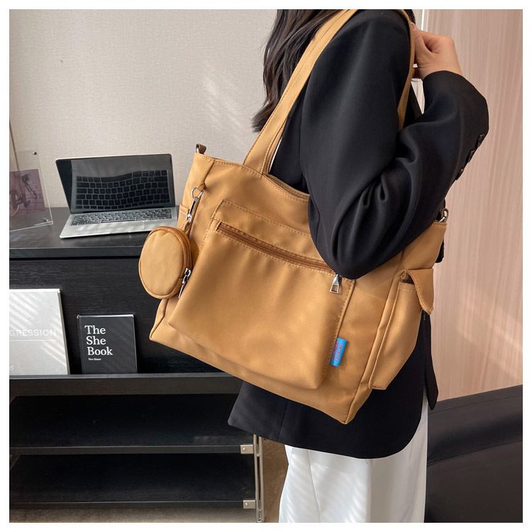 New Solid Color Canvas Bag Large Capacity Single Shoulder Bag Handheld Student Versatile Tote Bag Crossbody Bag_voghion.com