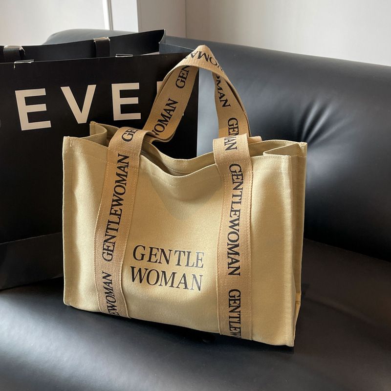 Large capacity canvas for women 2024 new fashionable letter class commuting handbag simple casual shoulder bag_voghion.com