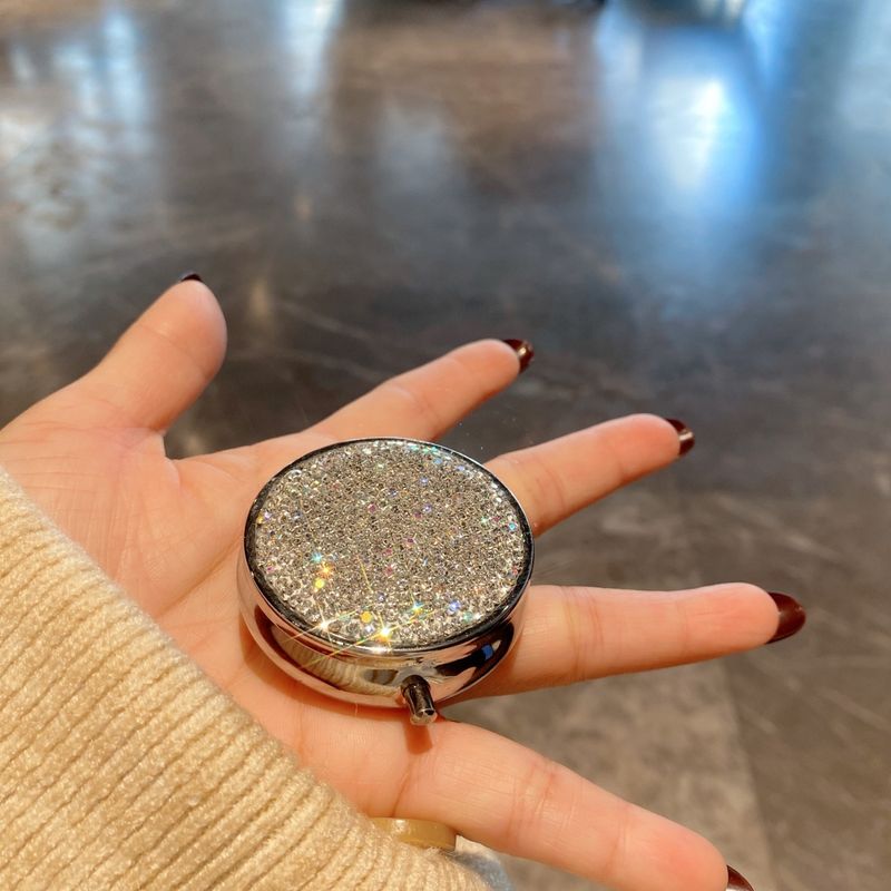Luxury Diamond-Studded Round Pill Organizer – 7-Compartment Stainless Steel Medicine Case With Mirror Finish, Compact & Travel-Friendly_voghion.com