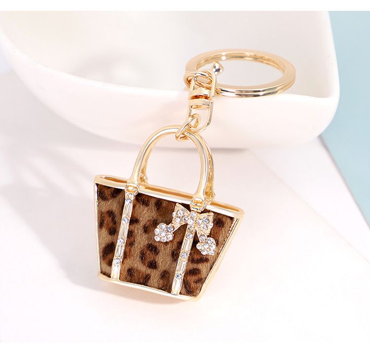 Portachiavi creativo a forma di borsa con stampa leopardata, ciondolo per auto squisito, piccolo regalo._voghion.com
