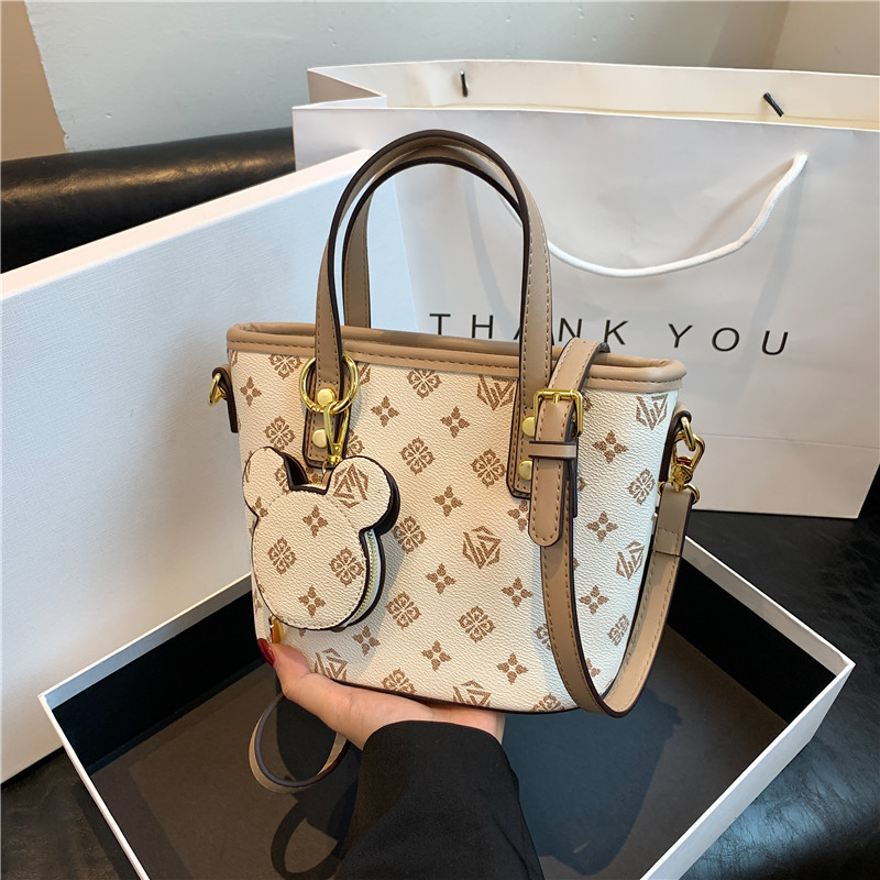 Cross-border bag women's bag 2023 new high-value fashion retro printing portable shoulder messenger bag bucket bag_voghion.com