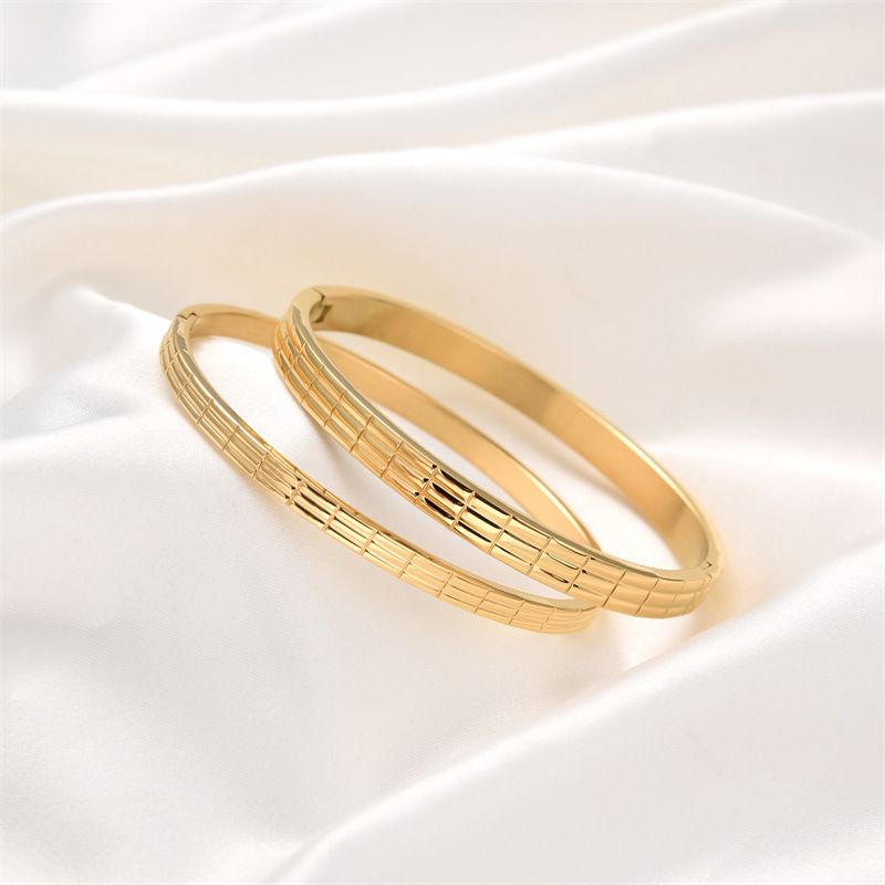 Braccialetti in oro e argento color rosa, in acciaio inossidabile, con fibbia a graticcio, aperti, in titanio e acciaio._voghion.com