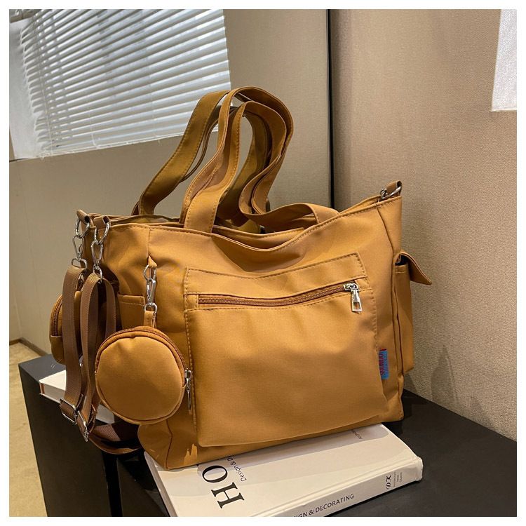 New Solid Color Canvas Bag Large Capacity Single Shoulder Bag Handheld Student Versatile Tote Bag Crossbody Bag_voghion.com