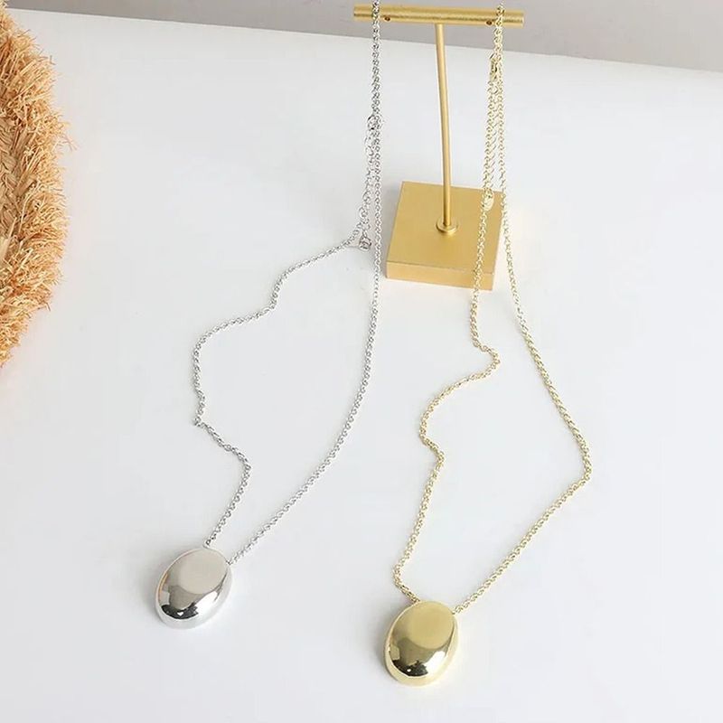 2025 Women Fashion Brand new matte metal oval pendant, geometric long women's sweater luxurious and charming fine necklace, artificial_voghion.com