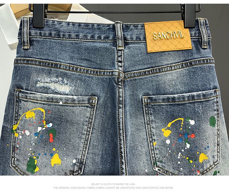 Herrenbekleidung verwaschene blaue zerrissene Jeansshorts Herren trendige Ink Splash Graffiti Slim Fit Fünf-Punkt-Hose_voghion.com